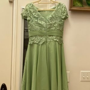 Bridesmaid dress.  Sage green with lace detail.  Built in bra. Knee length. New